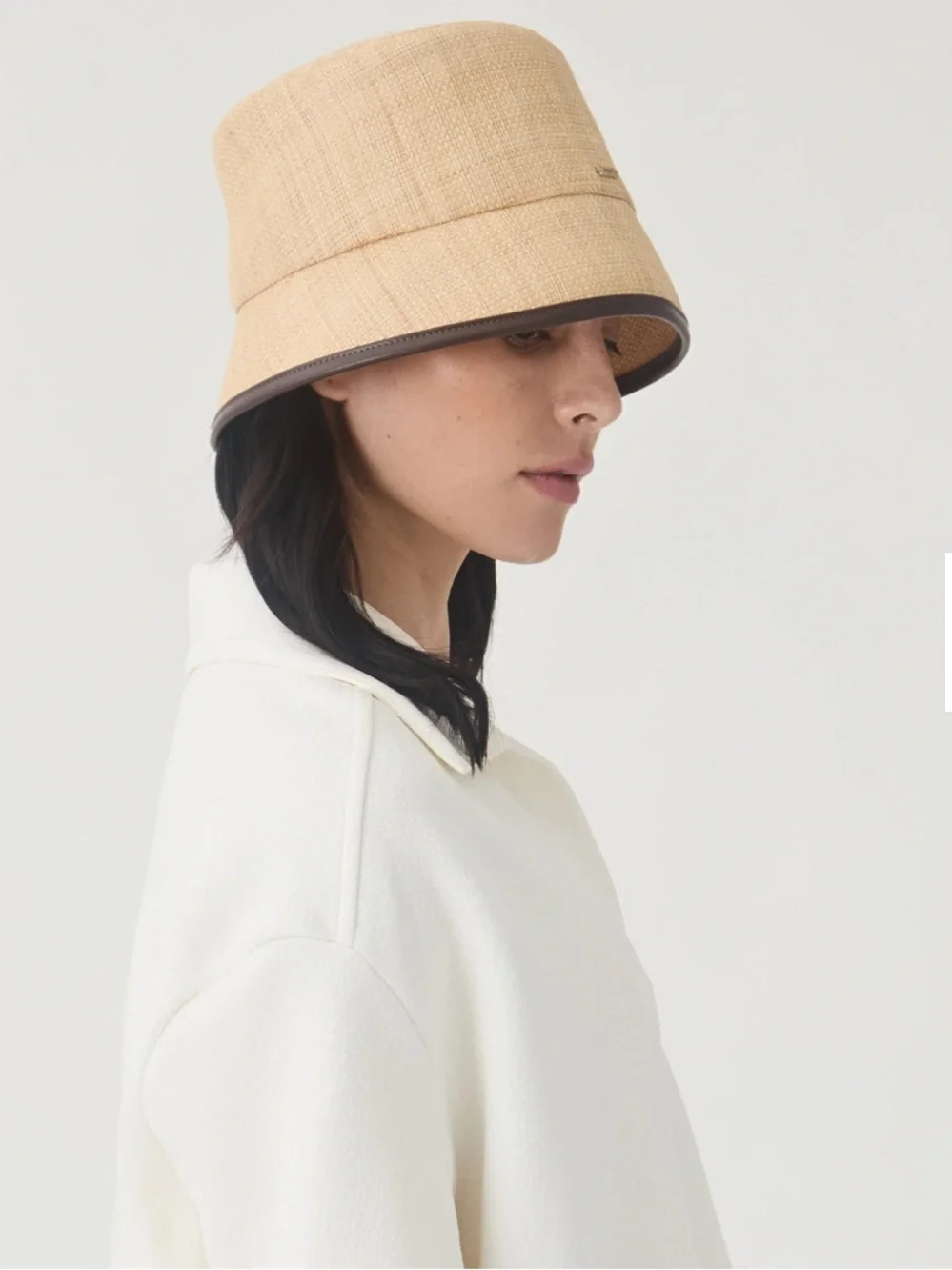 EUGENIA KIM | Natural Raffua Bucket Hat with Vegan Leather Binding at Brim Edge
